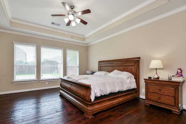 26706 Grey Swan Dr, Katy, TX 77494 - bedroom with a tray ceiling, dark wood finished floors, ornamental molding, baseboards, and ceiling fan