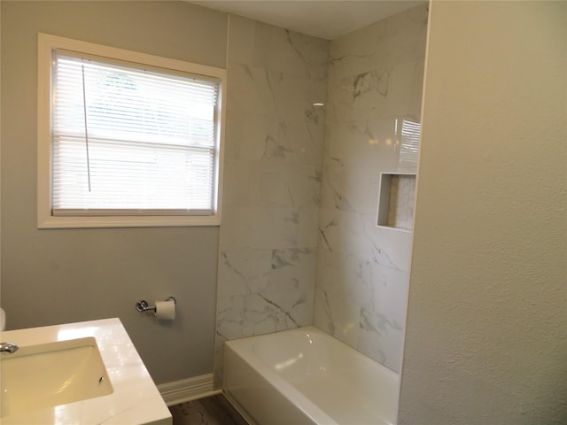 1103 Jocelyn St, Houston, TX 77023 - bathroom with shower / bathtub combination, vanity, and baseboards