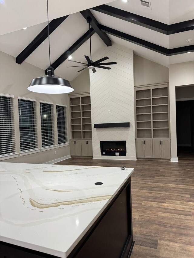 262 Rd 660, Dayton, TX 77535 - living room featuring dark wood finished floors, a ceiling fan, a large fireplace, and recessed lighting