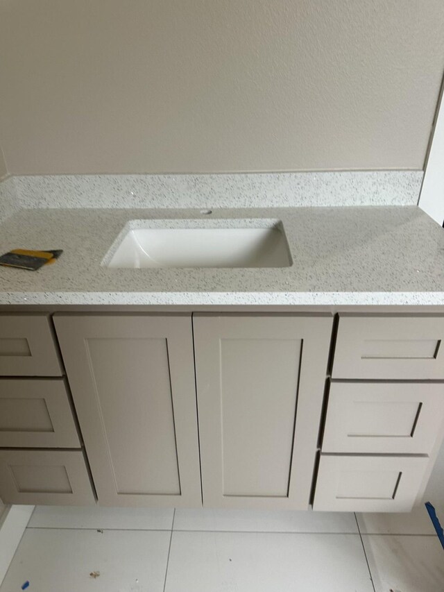 262 Rd 660, Dayton, TX 77535 - bathroom with tile patterned floors and a sink