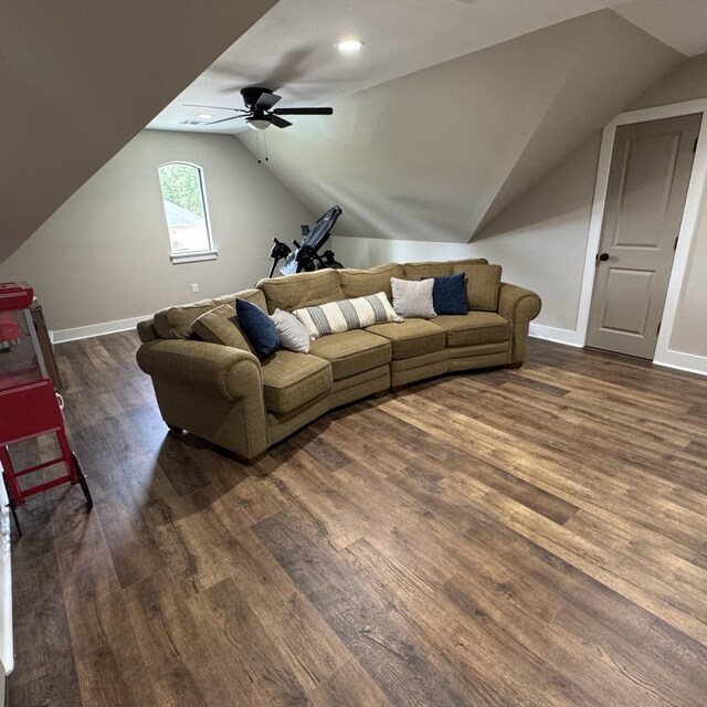 262 Rd 660, Dayton, TX 77535 - living area featuring lofted ceiling, dark wood finished floors, a ceiling fan, and baseboards