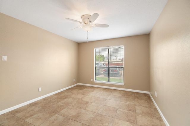 16111 Aspenglenn Dr Unit 803, Houston, TX 77084 - unfurnished room with ceiling fan, baseboards, and light tile patterned floors