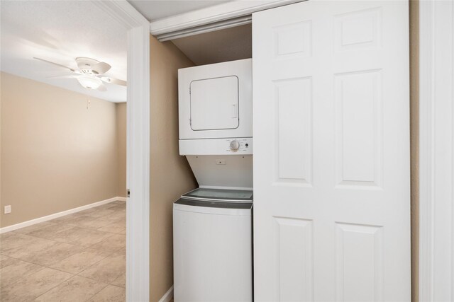 16111 Aspenglenn Dr Unit 803, Houston, TX 77084 - laundry room with estacked washer and dryer, ceiling fan, and baseboards