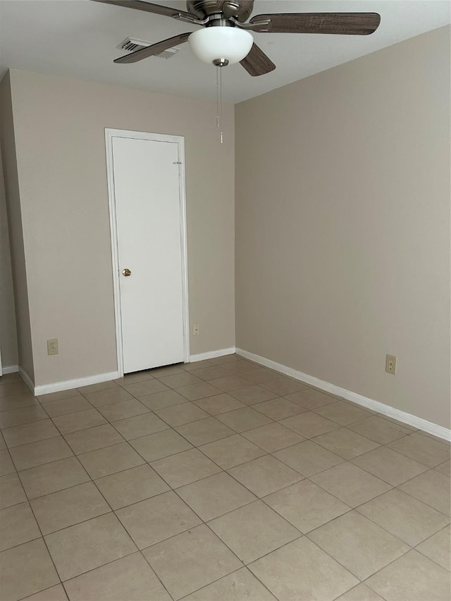 18727 Parfield Ln, Houston, TX 77084 - spare room featuring ceiling fan, baseboards, and light tile patterned flooring