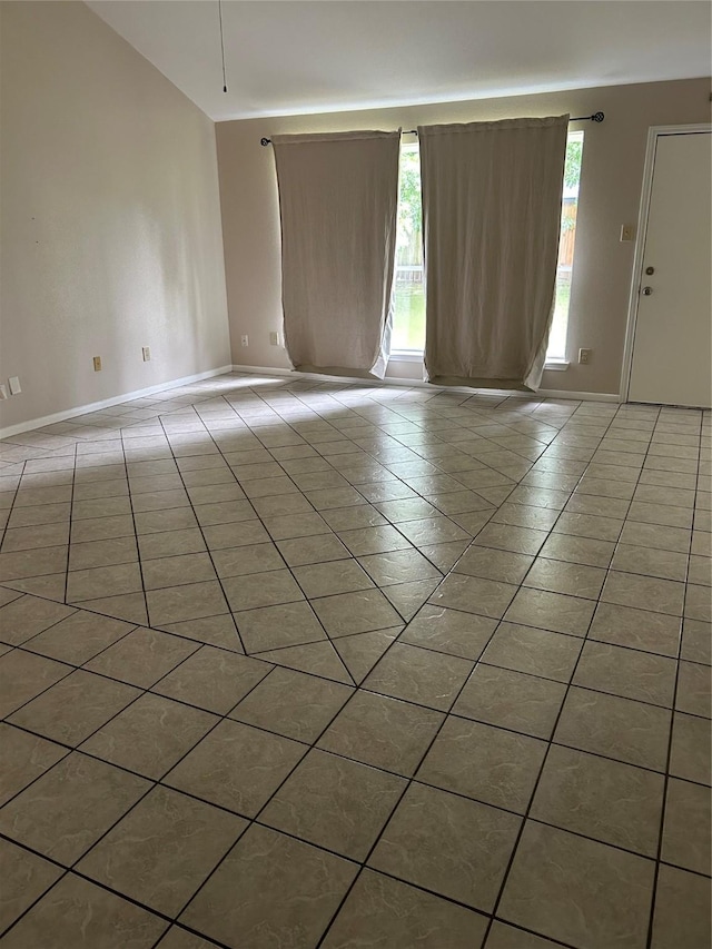 18727 Parfield Ln, Houston, TX 77084 - tiled empty room with baseboards