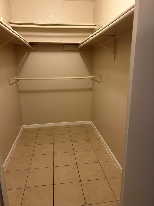 18727 Parfield Ln, Houston, TX 77084 - spacious closet with light tile patterned floors