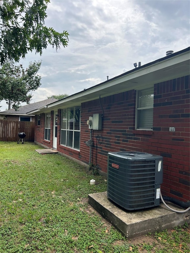 18727 Parfield Ln, Houston, TX 77084 - view of yard with central AC unit