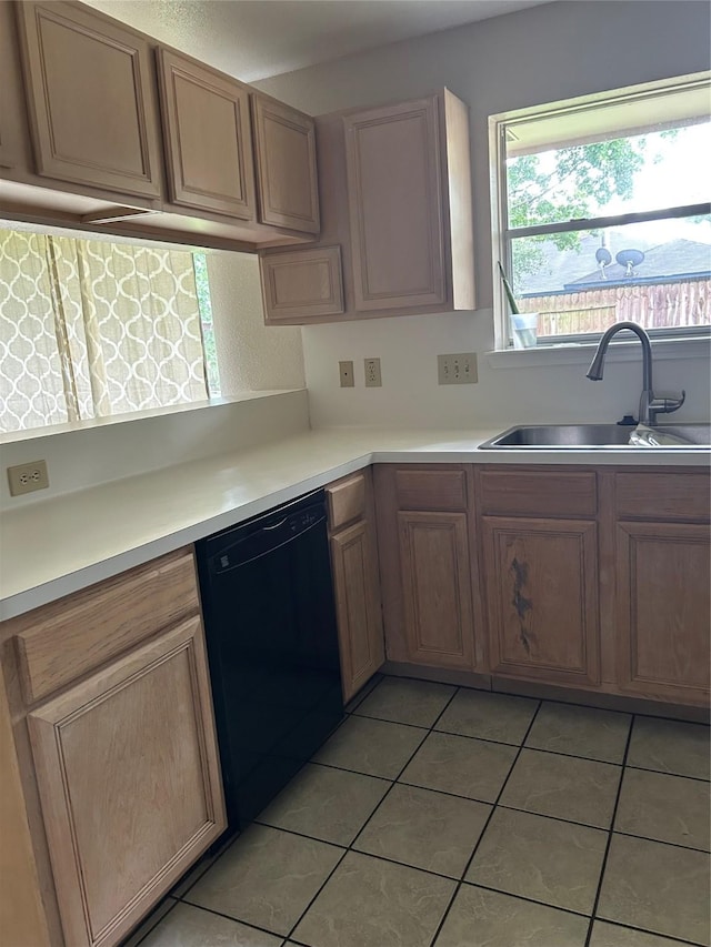 18727 Parfield Ln, Houston, TX 77084 - kitchen with dishwasher, a sink, light tile patterned flooring, and light countertops