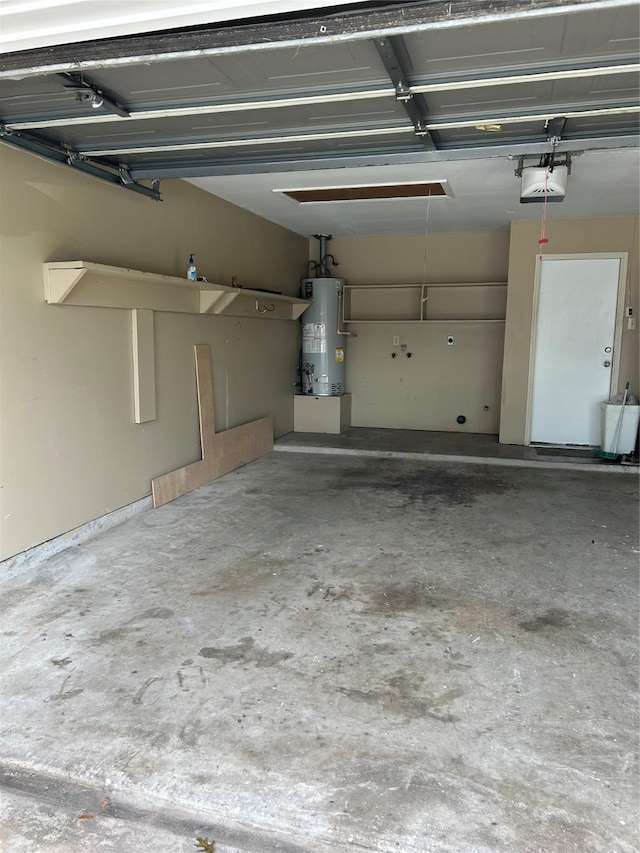 18727 Parfield Ln, Houston, TX 77084 - garage featuring water heater and a garage door opener