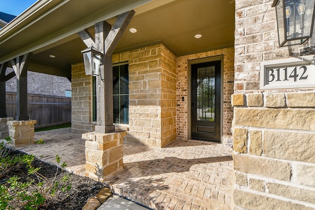 31142 Crescent Hill Dr, Fulshear, TX 77441 - doorway to property with brick siding