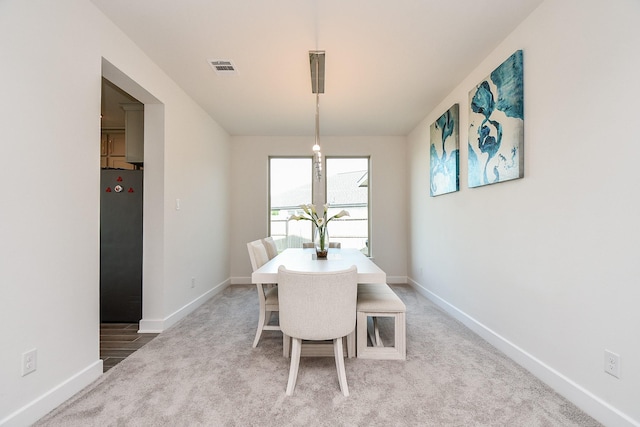 31142 Crescent Hill Dr, Fulshear, TX 77441 - dining area with baseboards and light colored carpet