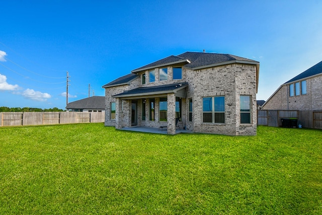 31142 Crescent Hill Dr, Fulshear, TX 77441 - rear view of house with a patio and brick siding