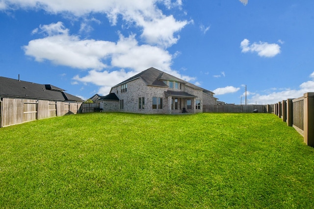 31142 Crescent Hill Dr, Fulshear, TX 77441 - rear view of property featuring brick siding
