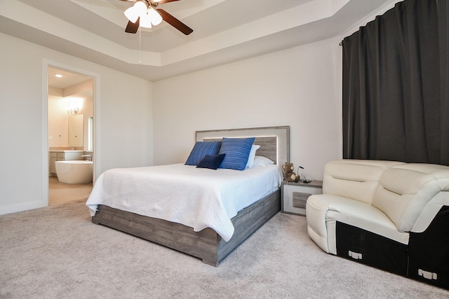 31142 Crescent Hill Dr, Fulshear, TX 77441 - carpeted bedroom with connected bathroom, ceiling fan, and baseboards