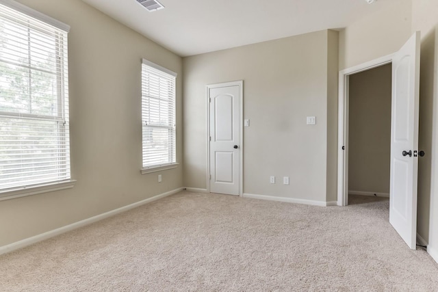 162 Cheswood Forest Pl, Montgomery, TX 77316 - unfurnished bedroom with light carpet and baseboards