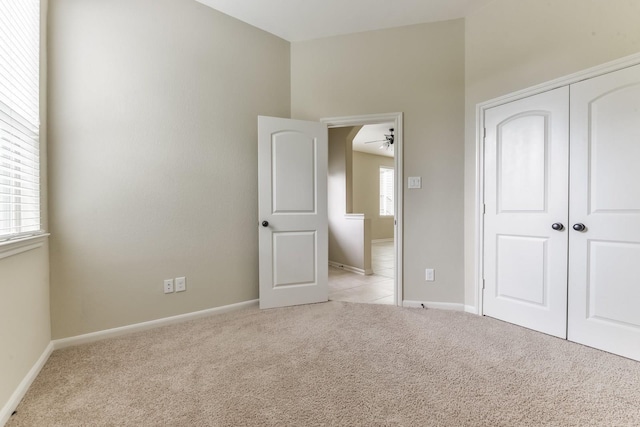 162 Cheswood Forest Pl, Montgomery, TX 77316 - unfurnished bedroom with carpet, baseboards, and a closet