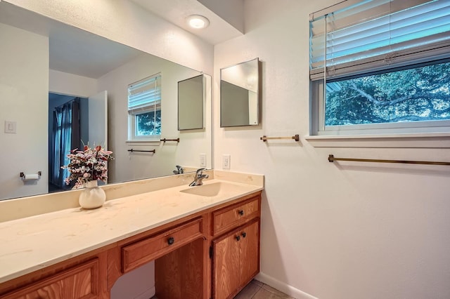 131 Park Dr, Point Blank, TX 77364 - bathroom with vanity, tile patterned flooring, and baseboards