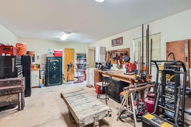 131 Park Dr, Point Blank, TX 77364 - misc room with a workshop area and concrete floors