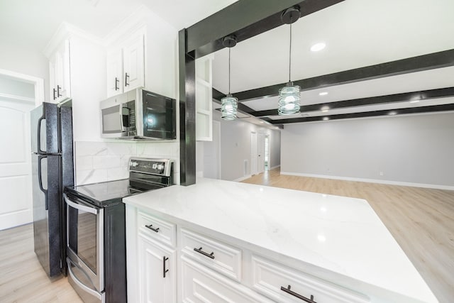 603 W Dallas St, Conroe, TX 77301 - kitchen with stainless steel appliances, light wood finished floors, light stone countertops, white cabinets, and beamed ceiling