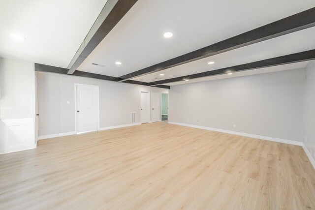 603 W Dallas St, Conroe, TX 77301 - finished below grade area featuring light wood-style flooring, baseboards, and recessed lighting
