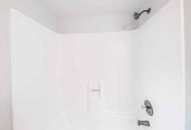 603 W Dallas St, Conroe, TX 77301 - bathroom view of bathing tub / shower combination