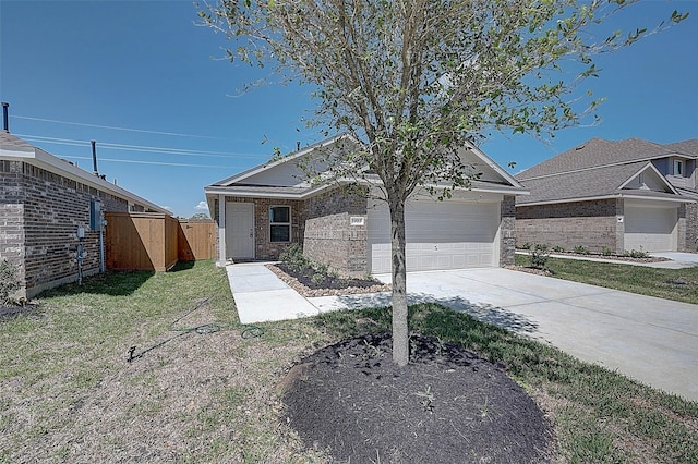 19915 Epirus Shores Dr, Hockley, TX 77447 - view of front of house with driveway, an attached garage, and brick siding