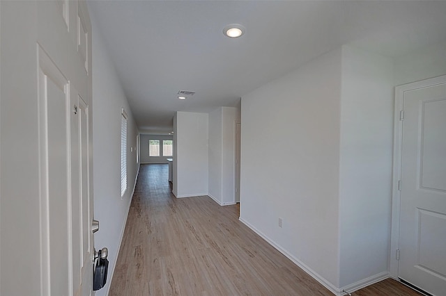 19915 Epirus Shores Dr, Hockley, TX 77447 - hallway featuring light wood finished floors, baseboards, and recessed lighting