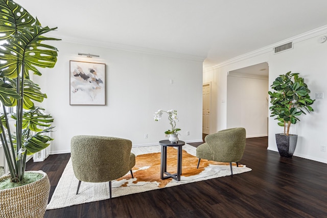 651 Bering Dr Unit 906, Houston, TX 77057 - sitting room with wood finished floors, crown molding, and baseboards