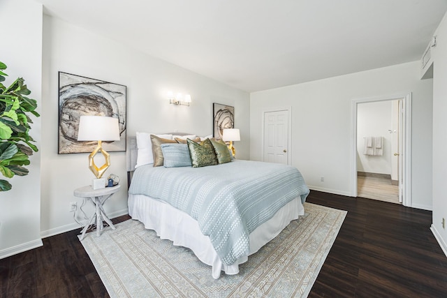 651 Bering Dr Unit 906, Houston, TX 77057 - bedroom featuring wood finished floors and baseboards
