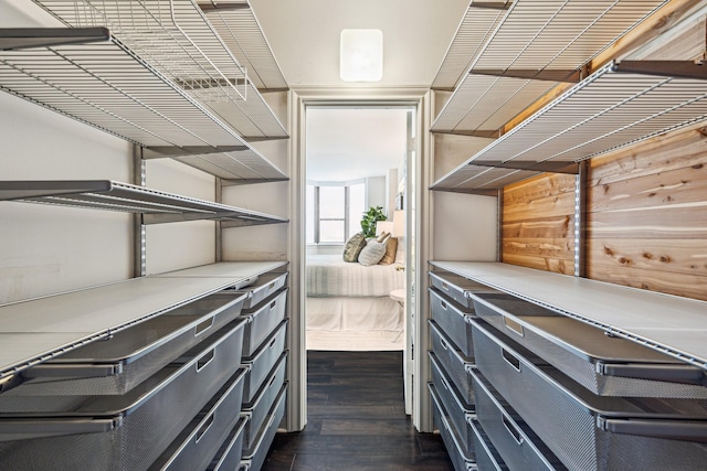 651 Bering Dr Unit 906, Houston, TX 77057 - spacious closet featuring dark wood-style floors