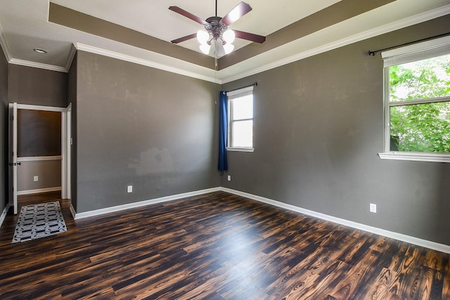 3544 Woods Estates Dr, Conroe, TX 77304 - empty room featuring plenty of natural light, ceiling fan, wood finished floors, ornamental molding, and baseboards