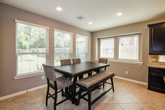 3544 Woods Estates Dr, Conroe, TX 77304 - dining area with light tile patterned floors, baseboards, and recessed lighting