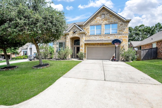 3544 Woods Estates Dr, Conroe, TX 77304 - view of front of property with an attached garage, stone siding, and concrete driveway