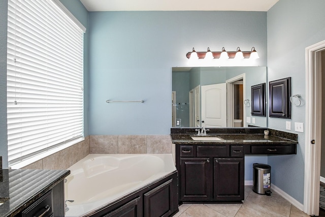 3544 Woods Estates Dr, Conroe, TX 77304 - bathroom with a bath, vanity, and tile patterned flooring