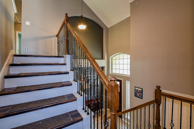 3544 Woods Estates Dr, Conroe, TX 77304 - staircase featuring crown molding and high vaulted ceiling