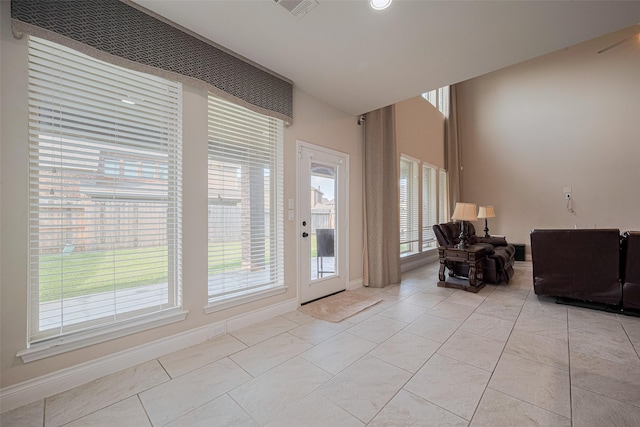 3519 Brampton Island Dr, Katy, TX 77494 - interior space featuring healthy amount of natural light, baseboards, and light tile patterned floors