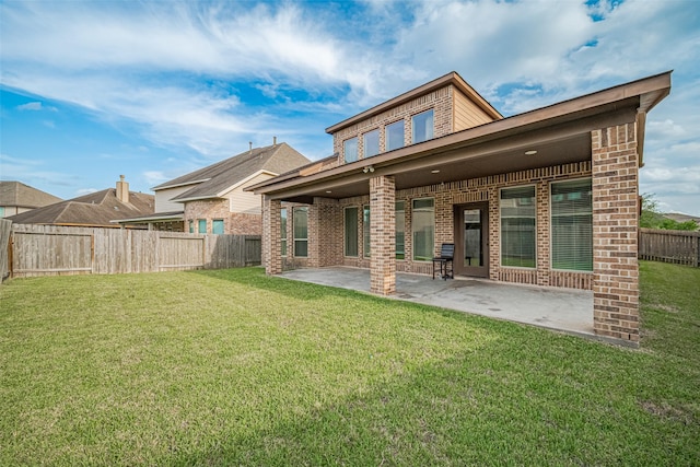 3519 Brampton Island Dr, Katy, TX 77494 - back of house featuring brick siding and a patio