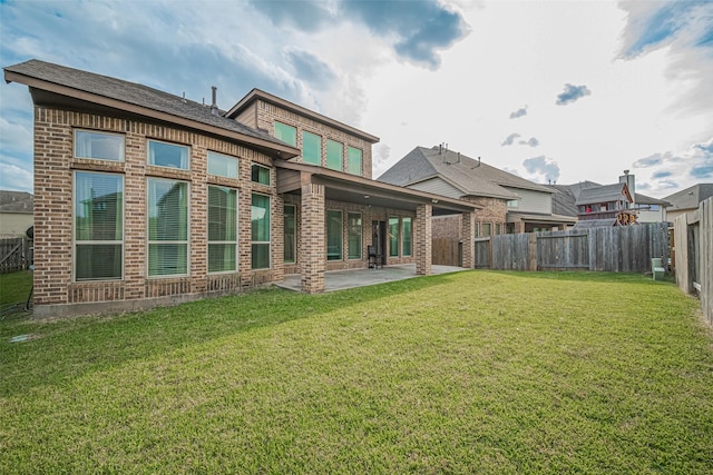 3519 Brampton Island Dr, Katy, TX 77494 - rear view of property featuring brick siding and a patio area