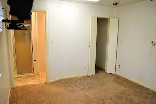 17551 W Fm 1097th Rd, Montgomery, TX 77356 - unfurnished bedroom featuring light carpet and baseboards