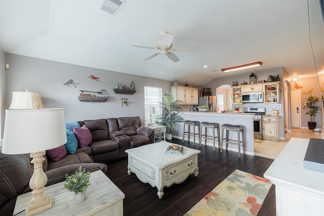 2238 Sterling Oaks Dr, Rosharon, TX 77583 - living area featuring ceiling fan, lofted ceiling, and light wood finished floors