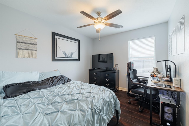 2238 Sterling Oaks Dr, Rosharon, TX 77583 - bedroom with wood finished floors, a desk, a ceiling fan, and baseboards