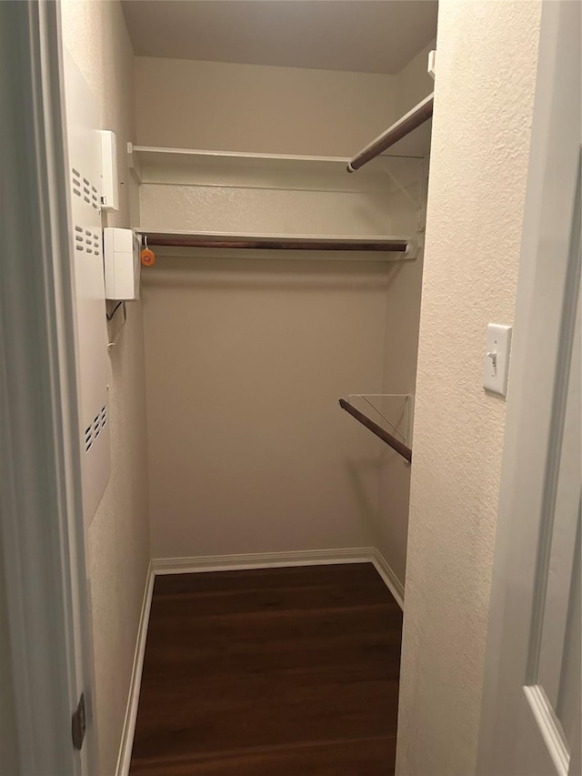 6015 Biltmore Ct, Rosenberg, TX 77471 - walk in closet with wood finished floors