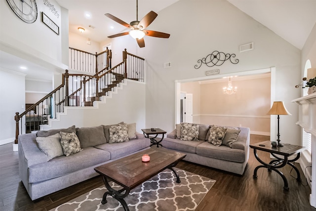 10402 Hondo Hill Rd, Houston, TX 77064 - living area with high vaulted ceiling, wood finished floors, stairway, ceiling fan, and baseboards