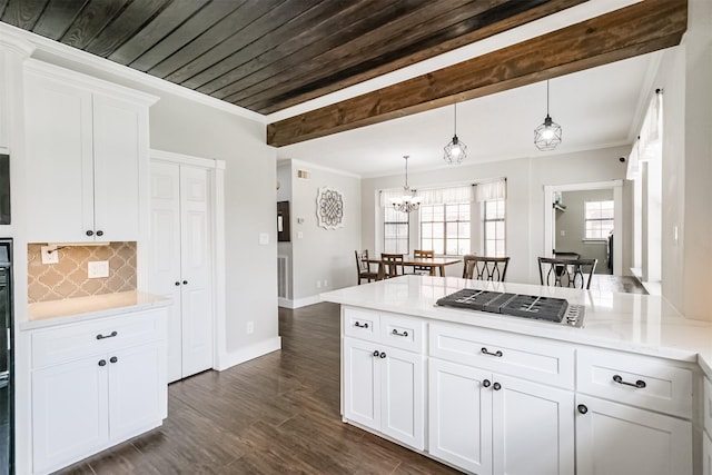 10402 Hondo Hill Rd, Houston, TX 77064 - kitchen featuring backsplash, a peninsula, gas stovetop, white cabinetry, and ornamental molding