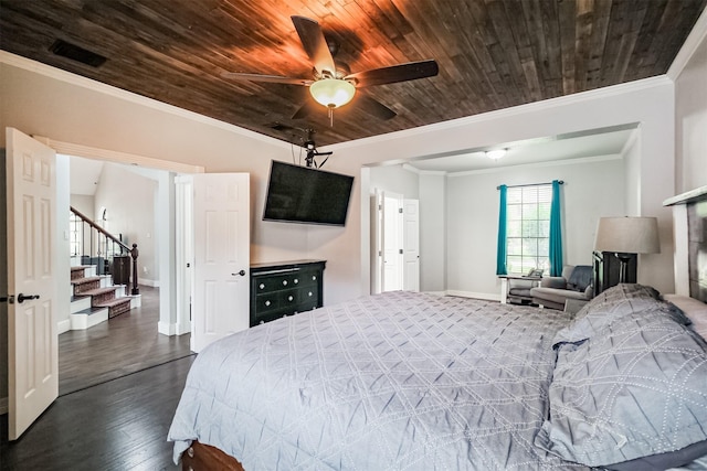 10402 Hondo Hill Rd, Houston, TX 77064 - bedroom with wood ceiling, dark wood-type flooring, ornamental molding, baseboards, and a ceiling fan
