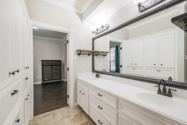 10402 Hondo Hill Rd, Houston, TX 77064 - bathroom featuring double vanity, ornamental molding, and baseboards