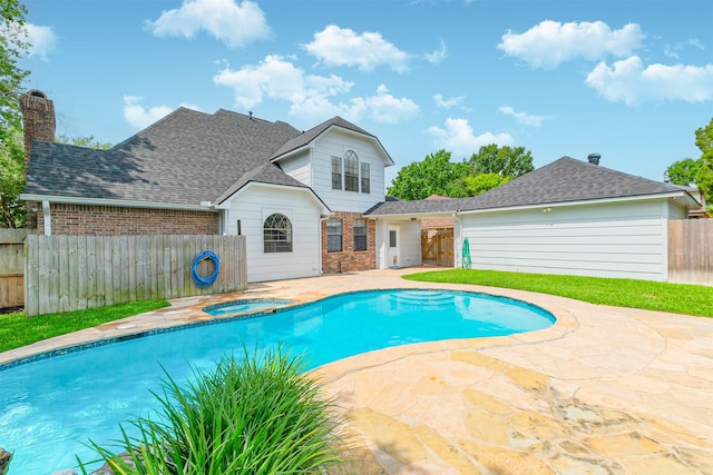 10402 Hondo Hill Rd, Houston, TX 77064 - view of swimming pool with an in-ground hot tub and a patio area