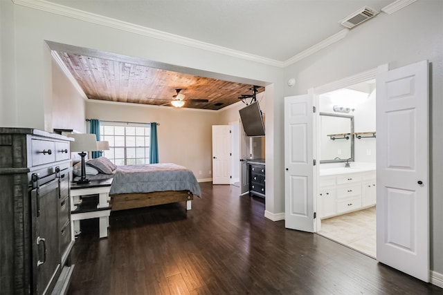 10402 Hondo Hill Rd, Houston, TX 77064 - bedroom with crown molding, dark wood-style floors, baseboards, ensuite bath, and a ceiling fan