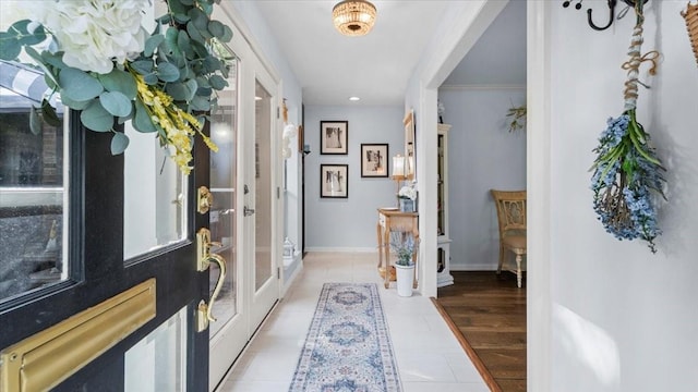 1925 Foxbriar Dr, Huntsville, TX 77340 - foyer entrance featuring light tile patterned floors, baseboards, and recessed lighting