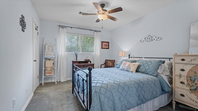 1925 Foxbriar Dr, Huntsville, TX 77340 - carpeted bedroom with baseboards and ceiling fan